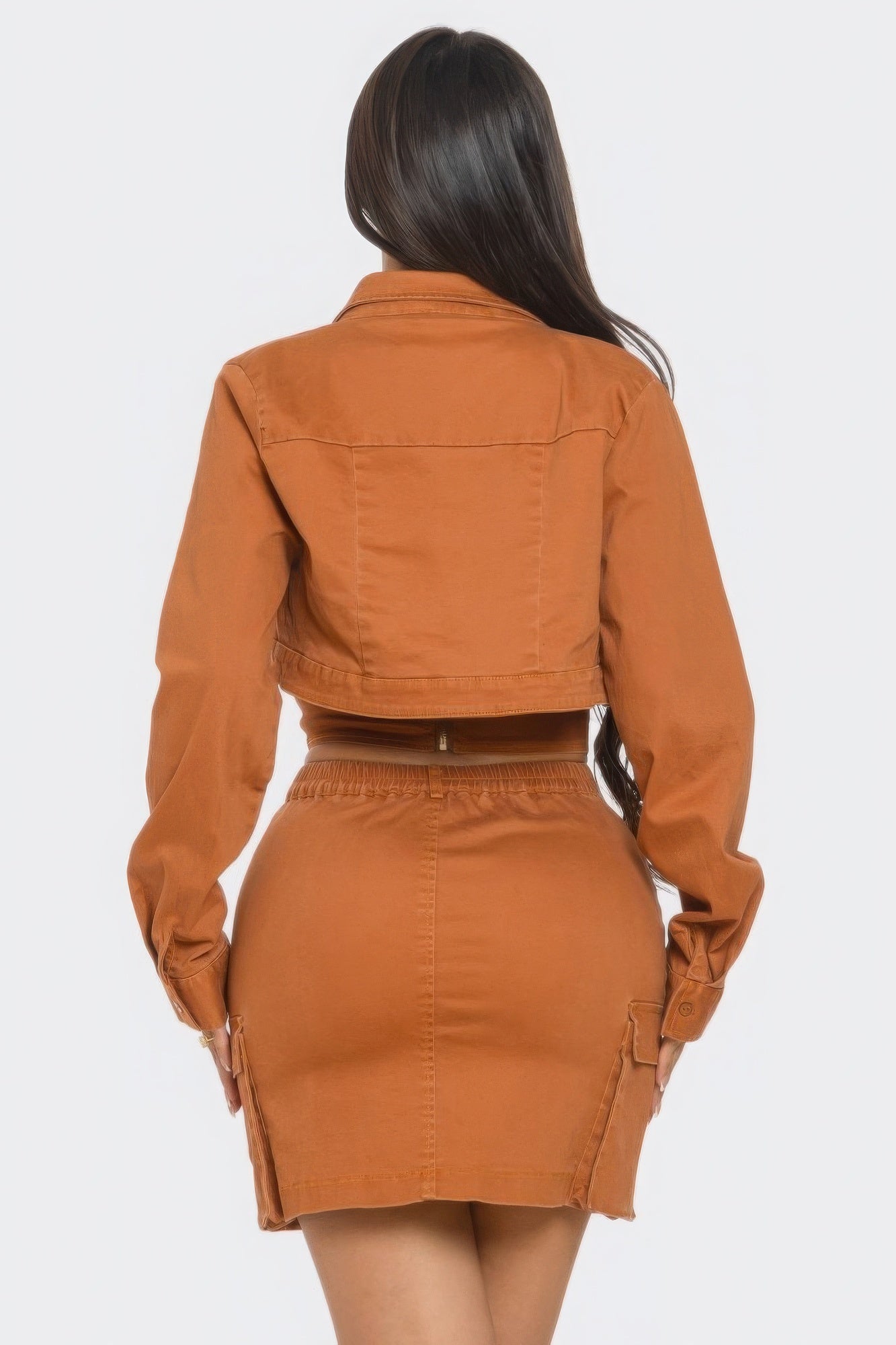 Stylish skirt, a chic top, and a matching crop jacket set